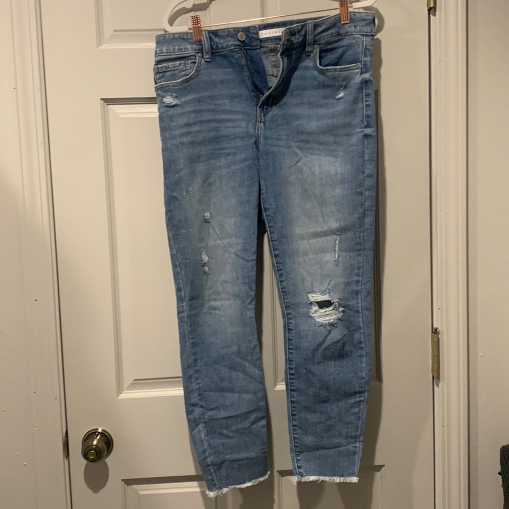 High rise Relaxed stretchy skinny denim jeans with frayed hems.Size 11.Worn once